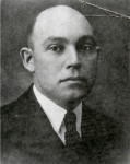 Headshot of Dr. Charles Meader in black and white