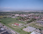 Aerial view of the Fitzsimons Army Medical Center showing many red roofed buildings and the property surrounding them.