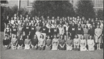 Black-and-white group portrait of the Women's Athletic Association at Mississippi State College in 1946. Most women wearing dark colored sweaters with the letter M.