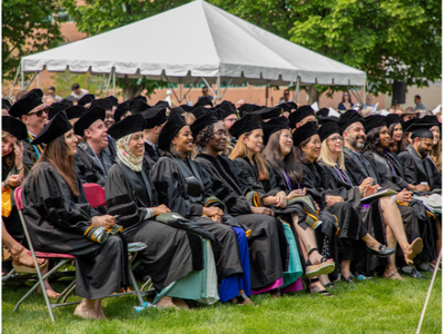Outdoor commencement ceremony audience