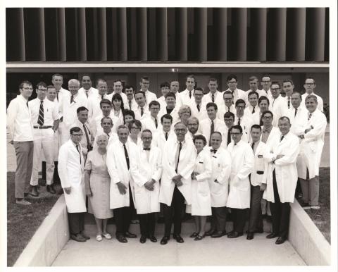 The faculty and residents of the Department of Pediatrics at the University of Colorado School of Medicine, participants are wearing white physician's coats.