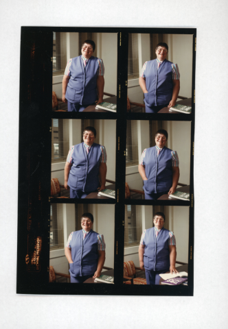 Six small headshots of Dr. Bonnie Camp wearing matching purple vest and pants with a striped short-sleeved blouse. She stands beside a chair with one hand resting on an open notebook on a desk, smiling at the camera.