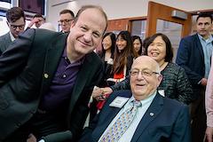 Colorado Governor Jared Polis and Henry Strauss at library celebration
