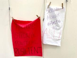 fabric pieces with positive messages for assault survivors