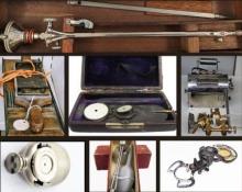 Medical artifacts including a cystoscope, pill roller, Lindsay style ophthalmoscope, McKenzie polygraph machine, sputum flask, atomizer, and an articulator.